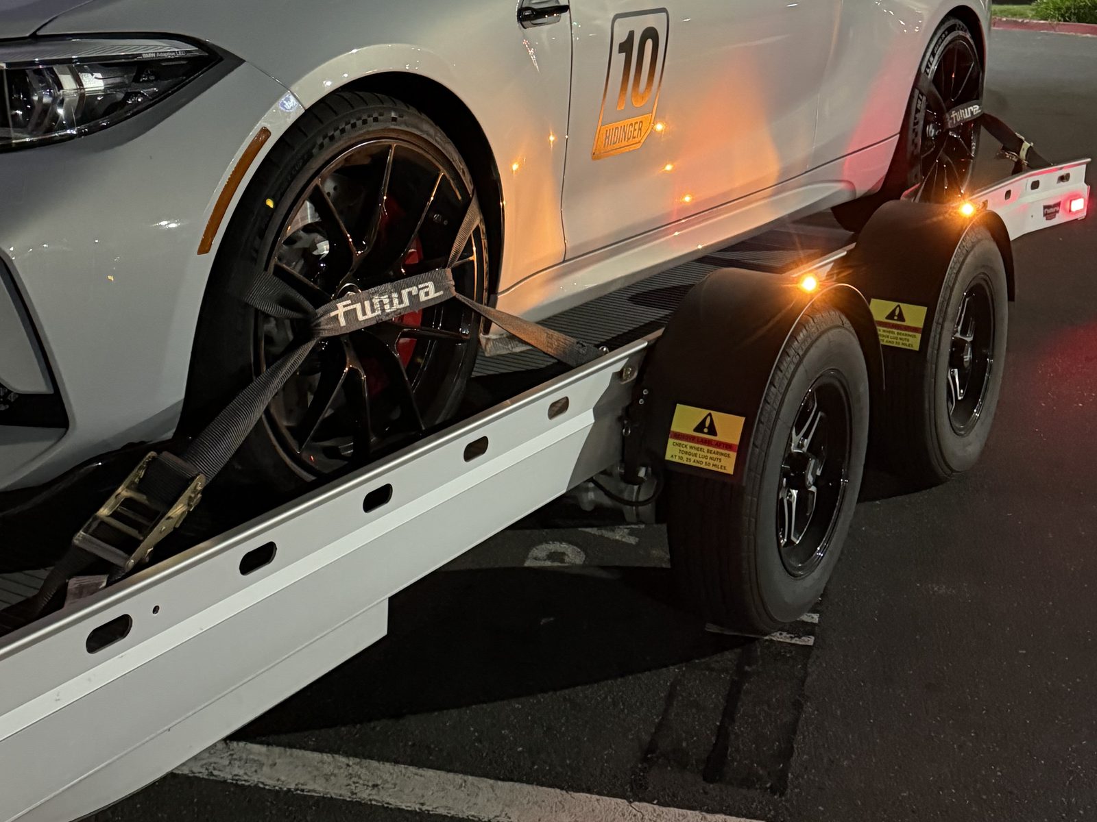 Close-up of tire straps and deck on the Futura Super Sport trailer